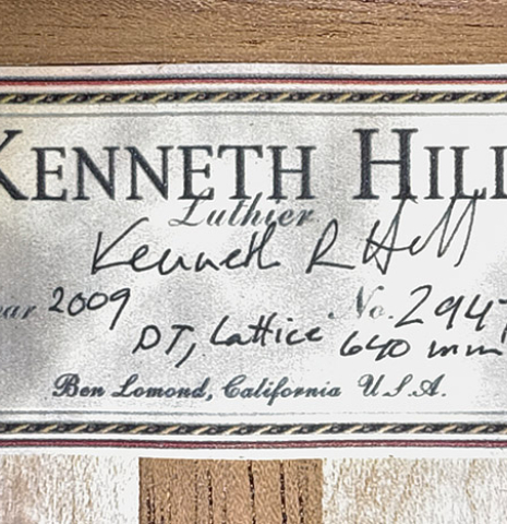 The label of a 2009 Kenny Hill "Torres 640 Lattice Double Top" classical guitar made of spruce and maple