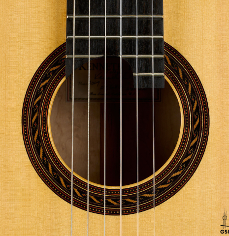 The rosette of a 2009 Kenny Hill "Torres 640 Lattice Double Top" classical guitar made of spruce and maple