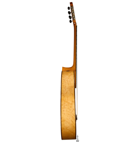 The side of a 2009 Kenny Hill "Torres 640 Lattice Double Top" classical guitar made of spruce and maple