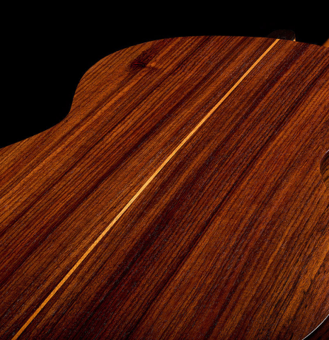 The back center seam of a 2025 Kenny Hill "Companion" classical guitar made of Indian rosewood for the top, back and sides