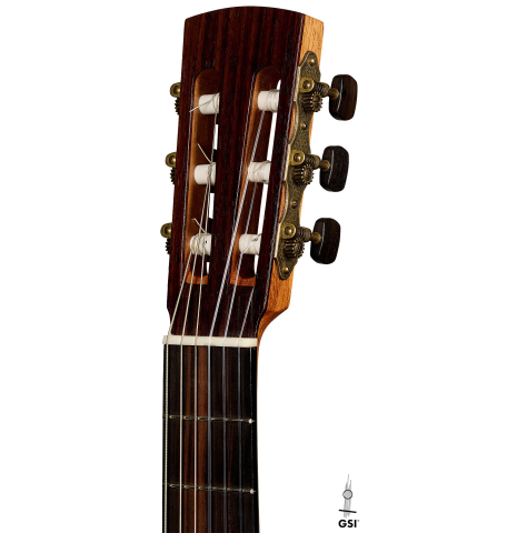 The headstock of a 2025 Kenny Hill "Companion" classical guitar made of Indian rosewood for the top, back and sides