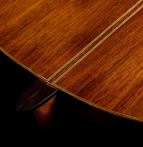 The heel, back binding and purfling of a 2025 Kenny Hill "Torres 640" classical guitar made of spruce and CSA rosewood