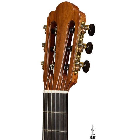 The headstock of a 2025 Kenny Hill "Torres 640" classical guitar made of spruce and CSA rosewood