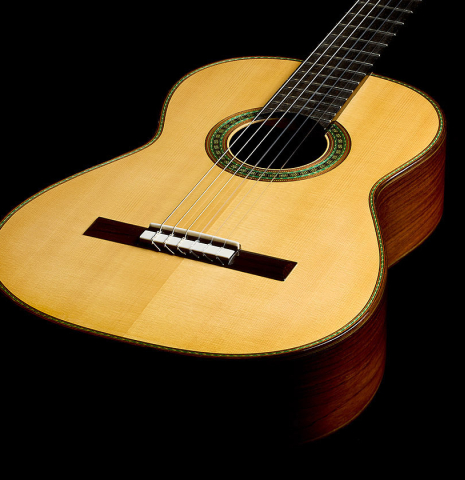 The soundboard and sides of a 2025 Kenny Hill "Torres 640" classical guitar made of spruce and CSA rosewood