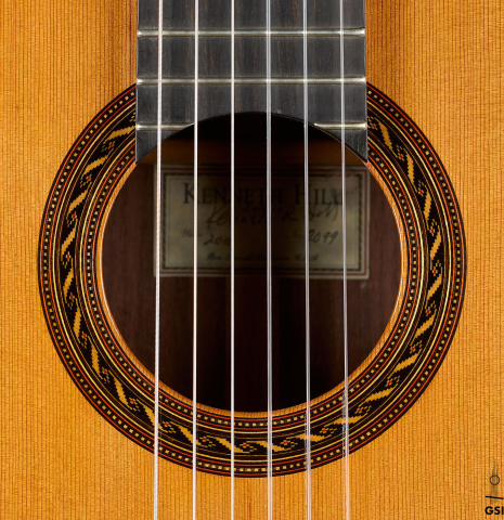 The rosette of a 2010 Kenny Hill "Signature CD/SP" classical guitar with electronics made of cedar/spruce and Indian rosewood