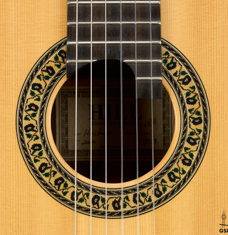 The rosette of a 2020 Kenny Hill "Heritage" classical guitar made of spruce and Indian rosewood