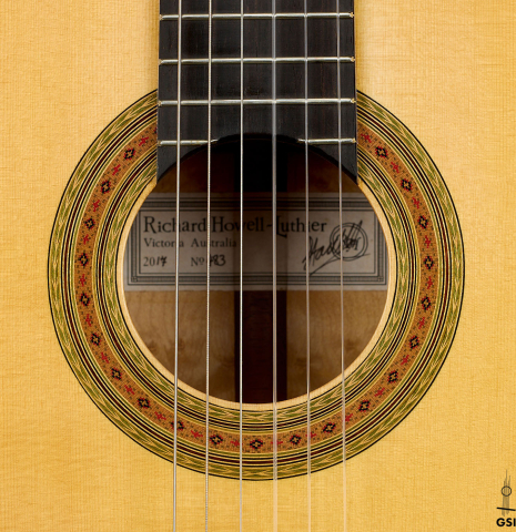 The rosette of a 2017 Richard Howell classical guitar made of spruce and maple