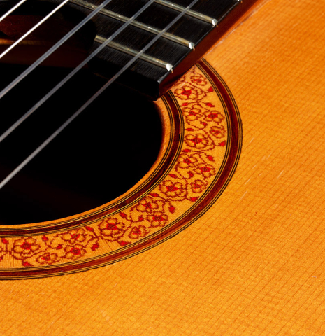 Detailed close-up of the rosette of a 1993 Thomas Humphrey "Millennium" classical guitar made with spruce and CSA rosewood.