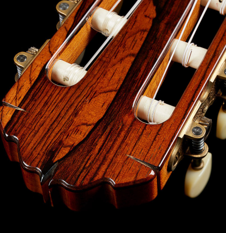 The headstock and tuning machines of a 1988 Thomas Humphrey "pre-Millenium" classical guitar made of spruce and CSA rosewood