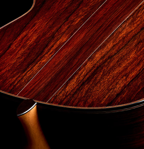 The heel, back binding and purfling of a 2025 Brian Itzkin classical guitar made of spruce and Indian rosewood