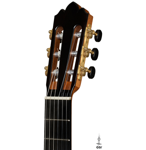 The headstock of a 2025 Brian Itzkin classical guitar made of spruce and Indian rosewood
