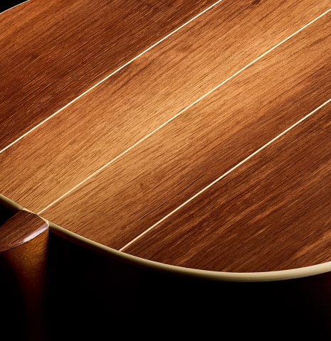 The heel, back binding and purfling of a 2026 Brian Itzkin "635" classical guitar made of spruce and African rosewood
