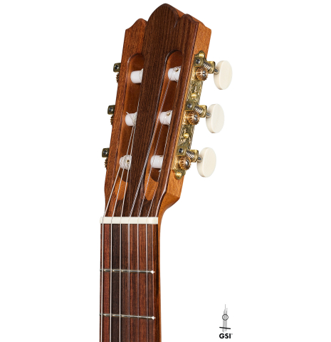 The headstock of a 2026 Brian Itzkin "635" classical guitar made of spruce and African rosewood