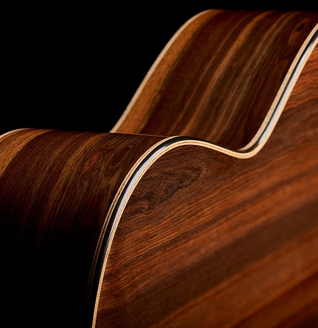 The back and sides of a 2026 Brian Itzkin classical guitar made of spruce and African rosewood