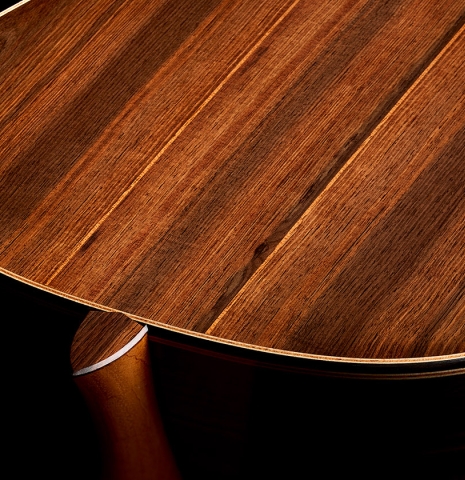 The heel, back binding and purfling of a 2026 Brian Itzkin classical guitar made of spruce and African rosewood