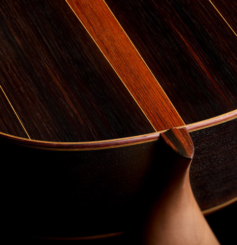 The heel, back binding and purfling of a 2026 Brian Itzkin classical guitar made of spruce and CSA rosewood