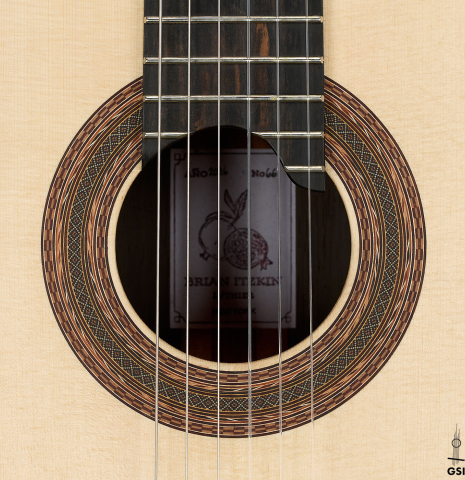 The rosette of a 2026 Brian Itzkin classical guitar made of spruce and CSA rosewood