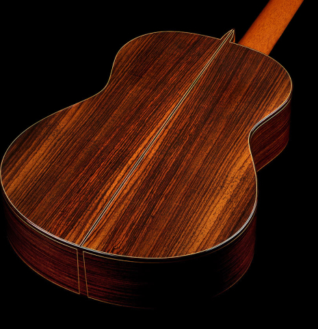 The back and sides of a 2002 Paul Jacobson classical guitar made of cedar and Indian rosewood