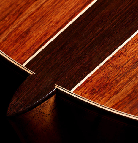 The heel, back binding and purfling of a 2025 Wolfgang Jellinghaus "Signature CD/CD" classical guitar made of cedar and Granadillo