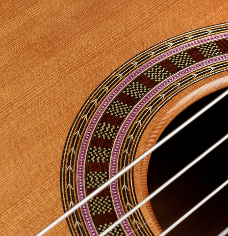 Close-up detail of the rosette of a 2025 Wolfgang Jellinghaus "Signature CD/CD" classical guitar made of cedar and Granadillo