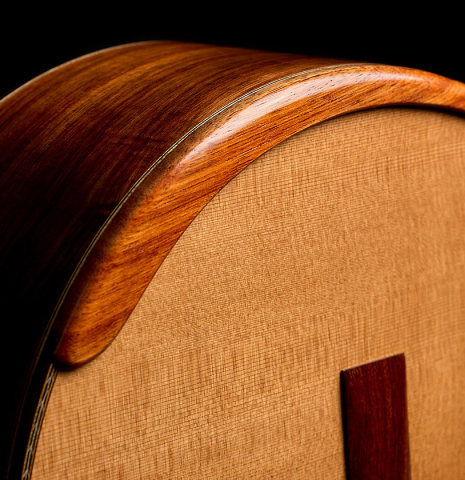 The soundboard, arm-rest and side of a 2025 Wolfgang Jellinghaus "Signature CD/CD" classical guitar made of cedar and granadillo