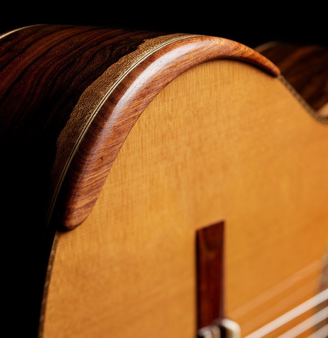 The armrest of a 2025 Wolfgang Jellinghaus "Signature CD/CD" classical guitar made of cedar and ziricote