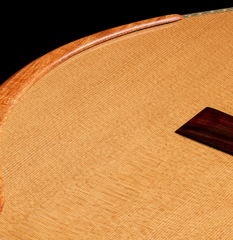 The soundboard and arm rest of a 2025 Wolfgang Jellinghaus "Signature CD/CD" classical guitar made of cedar and ziricote