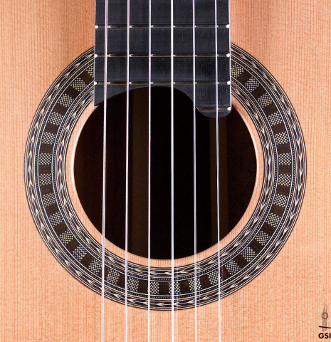 The rosette of a Wolfgang Jellinghaus "Signature CD/SP 640" classical guitar made of cedar and Granadillo