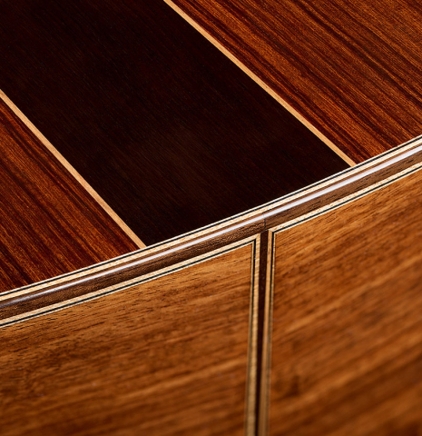 The central back wedge at the foot of a 2026 Wolfgang Jellinghaus "Signature CD/SP" classical guitar made of cedar/spruce and granadillo