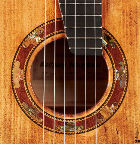 The rosette of a 2023 Wolfgang Jellinghaus "La Romantica 1a" romantic guitar made with spruce and maple.