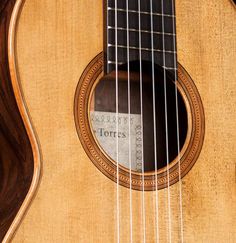 This is the rosette and soundboard of a Wolfgang Jellinghaus "Torres 77" classical guitar made of spruce and pau ferro