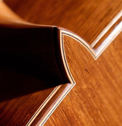 The heel and back of a 2020 Wolfgang Jellinghaus "Alemana EF CD/CD" CD/AR classical guitar made with double top cedar and African rosewood back and sides The heel and back of a 2020 Wolfgang Jellinghaus "Alemana EF CD/CD" CD/AR classical guitar made with double top cedar and African rosewood back and sides