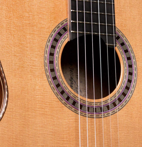 The soundboard and rosette of a 2020 Wolfgang Jellinghaus &quot;Alemana EF CD/CD&quot; CD/AR classical guitar made with double top cedar and African rosewood back and sides