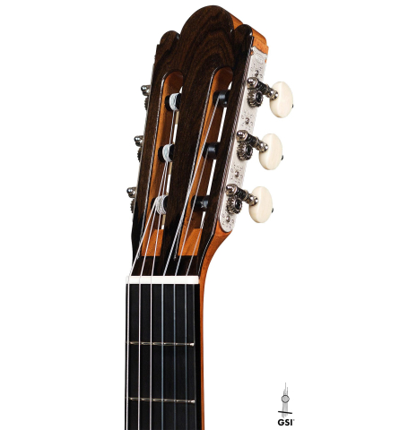 The headstock of a 2023 Wolfgang Jellinghaus “Torres 43” classical guitar made with spruce and maple.