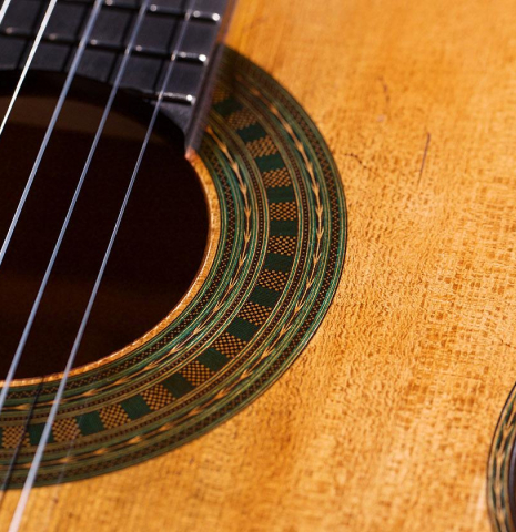 The soundboard of a 2023 Wolfgang Jellinghaus “Torres 43” classical guitar made with spruce and maple.