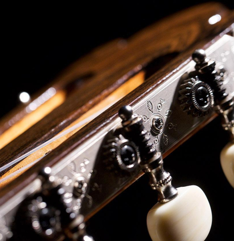 The machine heads of a 2023 Wolfgang Jellinghaus “Torres 43” classical guitar made with spruce and maple.
