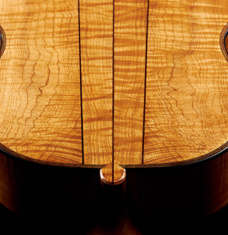 The four-piece back of a Wolfgang Jellinghaus “Torres 43” classical guitar made with spruce and maple.