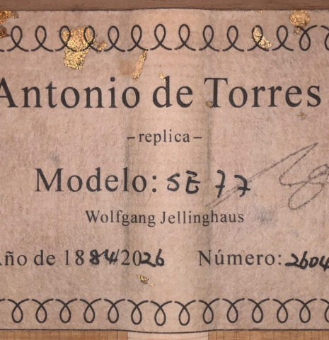 The label of a Wolfgang Jellinghaus "Torres 77" classical guitar made with spruce and cypress