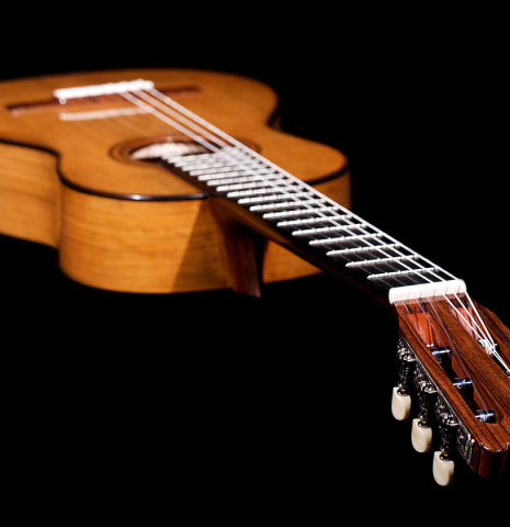 The fretboard and headstock of a Wolfgang Jellinghaus &quot;Torres 77&quot; classical guitar made with spruce and cypress