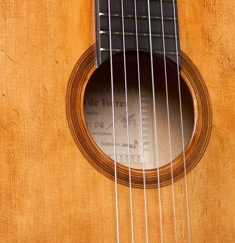 The detail of the top and rosette of a Wolfgang Jellinghaus “La Leona FE 04” made of spruce and cypress