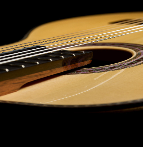 The soundboard and elevated fingerboard of a 2026 Wolfgang Jellinghaus "Signature SP/SP" double top classical guitar made of spruce and ziricote