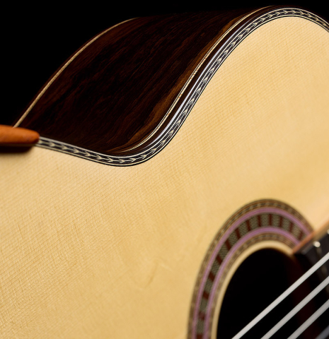 The soundboard and arm-rest of a 2026 Wolfgang Jellinghaus "Signature SP/SP" double top classical guitar made of spruce and ziricote