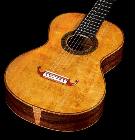 The soundboard of a Wolfgang Jellinghaus "La Romantica A" romantic guitar made with spruce and granadillo.