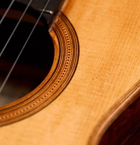 This is the front and rosette of a 2022 Wolfgang Jellinghaus &quot;Torres 77&quot; classical guitar
