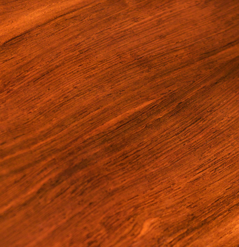 A close-up of the back of a Wolfgang Jellinghaus "Alemana EF SP/CD" double top classical guitar made of spruce and African rosewood