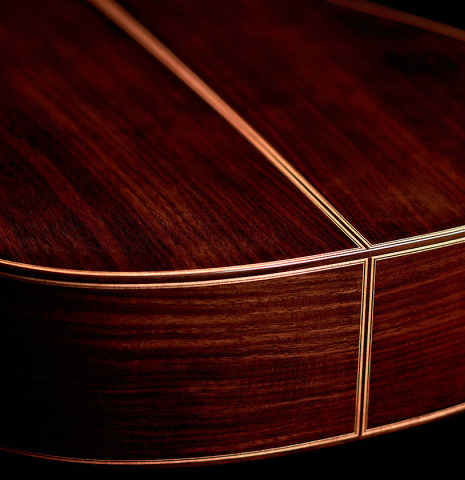 The back and sides of a 2022 Wolfgang Jellinghaus “Torres 43” classical guitar made with spruce and Indian rosewood