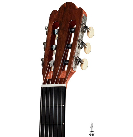 The headstock and tuners of a Wolfgang Jellinghaus “Torres 43” classical guitar made with spruce and Indian rosewood