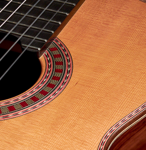 This is the rosette and soundboard of a 2022 Wolfgang Jellinghaus &quot;Espanola 1a&quot; guitar made with cedar top and African rosewood back and sides
