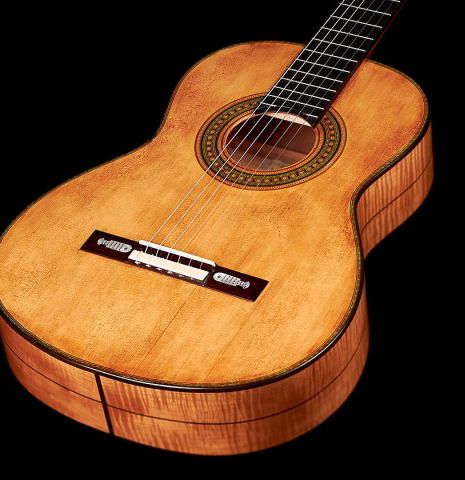 The soundboard of a Wolfgang Jellinghaus “Torres 49 - ex Tarrega” classical guitar made of spruce and maple