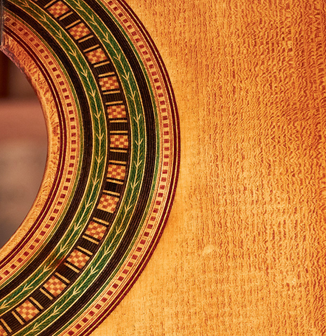 The top and rosette of a Wolfgang Jellinghaus “Torres 49 - ex Tarrega” classical guitar made of spruce and maple